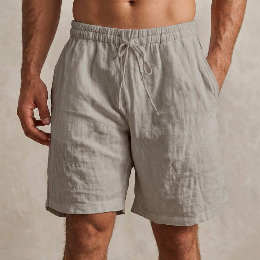 Gray men's casual drawstring shorts with side pockets, FJØRNA brand, comfortable lounge pants for everyday wear.