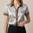 Gray FJØRNA summer leopard print blouse for women with short sleeves, stylish and comfortable women's top.