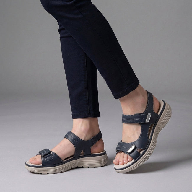 Gray FJØRNA orthopedic comfort fit sandals with chunky soles and adjustable straps, designed for support and casual wear.