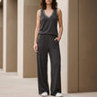 Gray FJØRNA relaxed V-neck sleeveless lounge set with wide-leg pants, featuring a comfortable, casual 2-piece design.
