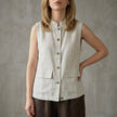 Gray sleeveless denim blouse for women with button front from FJØRNA, perfect for summer casual wear.