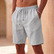 Gray men's casual drawstring shorts with straight legs and side pockets, made by FJØRNA.