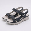 Gray FJØRNA orthopedic comfort fit sandals with chunky sole and adjustable straps, showcasing their supportive design and casual style.