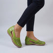 Green FJØRNA orthopedic wedge sandals with scalloped trim and side cut-outs, stylish and supportive footwear for comfort.