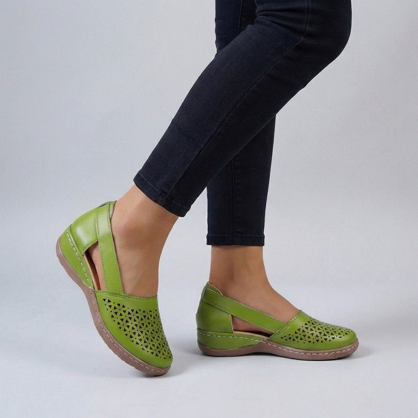 Green FJØRNA orthopedic wedge sandals with scalloped trim and side cut-outs, stylish and supportive footwear for comfort.