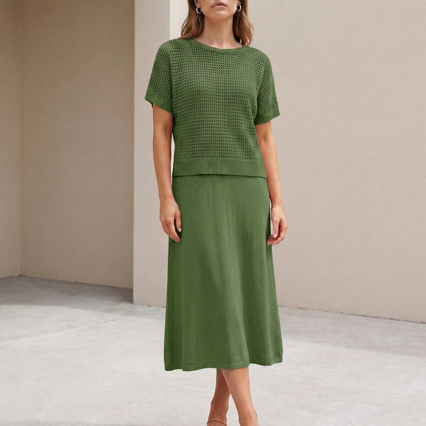 FJØRNA green flowing midi dress and cropped open-knit mesh top set, stylish 2-piece outfit with elegant, airy fabric.