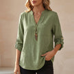 Green FJØRNA summer v-neck linen blouse for women, flowy and lightweight top perfect for warm weather.