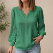 Green women's pullover blouse with V-neck, lace trim, and pintuck texture, by FJØRNA.