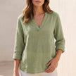 Green V-neck linen summer blouse for women by FJØRNA, casual lightweight top perfect for warm weather.