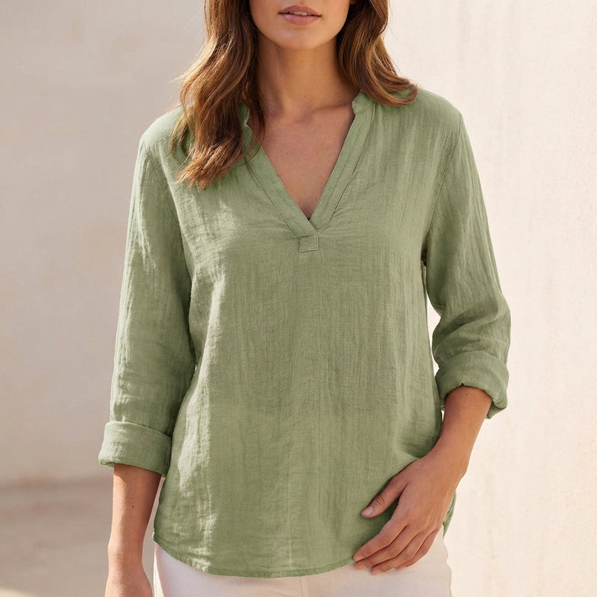 Green V-neck linen summer blouse for women by FJØRNA, casual lightweight top perfect for warm weather.