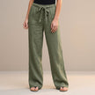 Green high-waist summer trousers for women by FJØRNA, made from breathable cotton fabric, stylish and comfortable for warm weather.