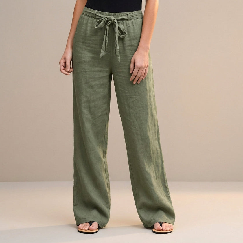 Green high-waist summer trousers for women by FJØRNA, made from breathable cotton fabric, stylish and comfortable for warm weather.