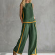 Green women's summer two-piece co-ord set with slit design, stylish and breathable FJØRNA clothing for warm weather.