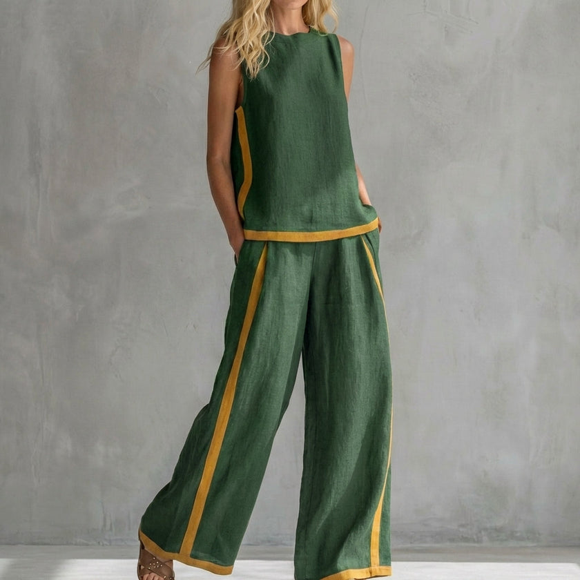 Green women's summer two-piece co-ord set with slit design, stylish and breathable FJØRNA clothing for warm weather.