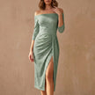 Green FJØRNA off-shoulder knit midi dress with ruched bodice and high slit, showcasing elegant style and fitted silhouette.