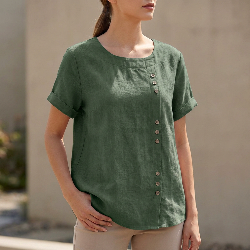 Green FJØRNA summer women's blouse with short sleeves and asymmetric linen design, stylish and breezy top for warm weather.