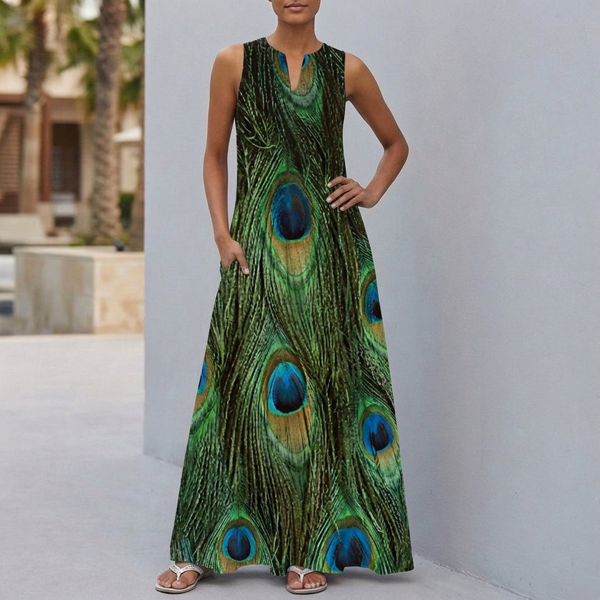 FJØRNA relaxed fit floral sleeveless maxi dress in green with pockets, flowing fabric, and a casual summer style for women.