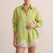 Green FJØRNA relaxed two-piece shirt and shorts set with lace trim, classic collar, lightweight and comfortable for casual wear.