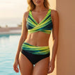 Green FJØRNA bikini top with a form-fitting cropped design, wrap front, and V-neck, perfect for beach or poolside wear.