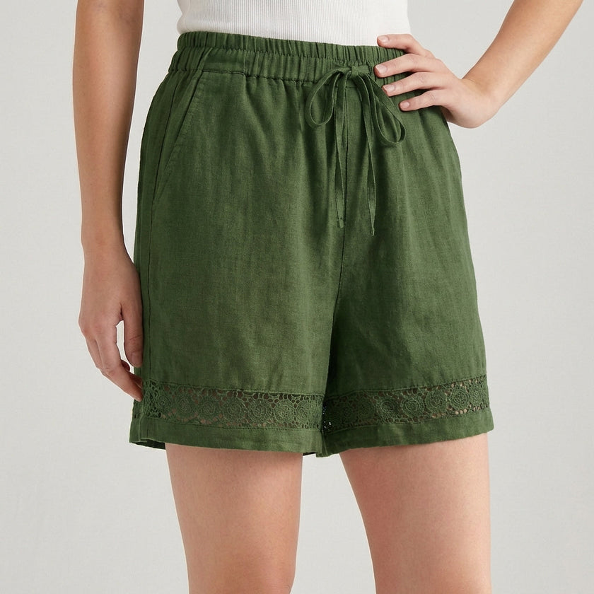 Green FJØRNA women's mini dress with drawstring detail, made of lightweight linen fabric, perfect for stylish summer wear.