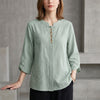 Green denim tassel summer blouse for women by FJØRNA, stylish top with tassel details and comfortable fit.