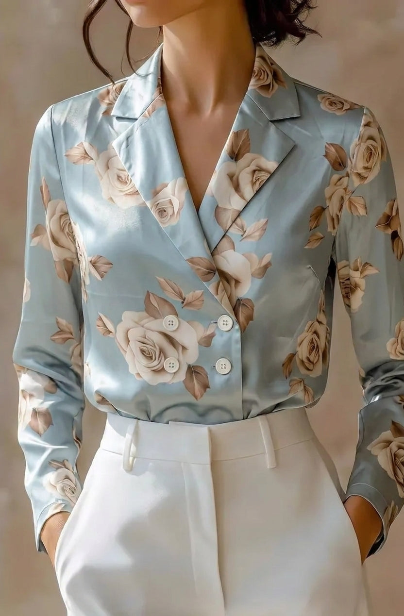Green and blue floral satin summer blouse for women by FJØRNA, showcasing lightweight, stylish top with floral print and satin fabric.