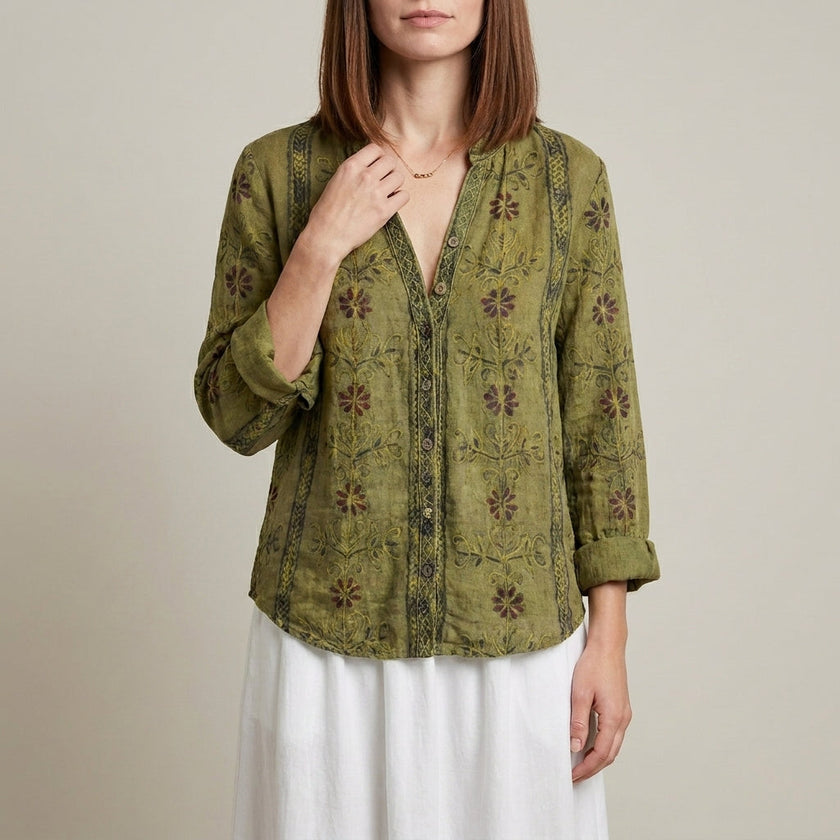 Green floral linen summer blouse for women with V-neck and long sleeves, by FJØRNA, featuring a relaxed fit and lightweight fabric.