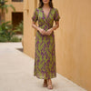 Green FJØRNA A-Line Wrap Front Maxi Dress with V-Neck, flowing fabric and elegant design perfect for summer or special occasions.
