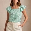 Green floral summer blouse for women with square neckline by FJØRNA, stylish top perfect for warm weather.