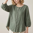 Green linen summer top for women by FJØRNA with a button-front casual design, perfect for warm-weather casual wear.