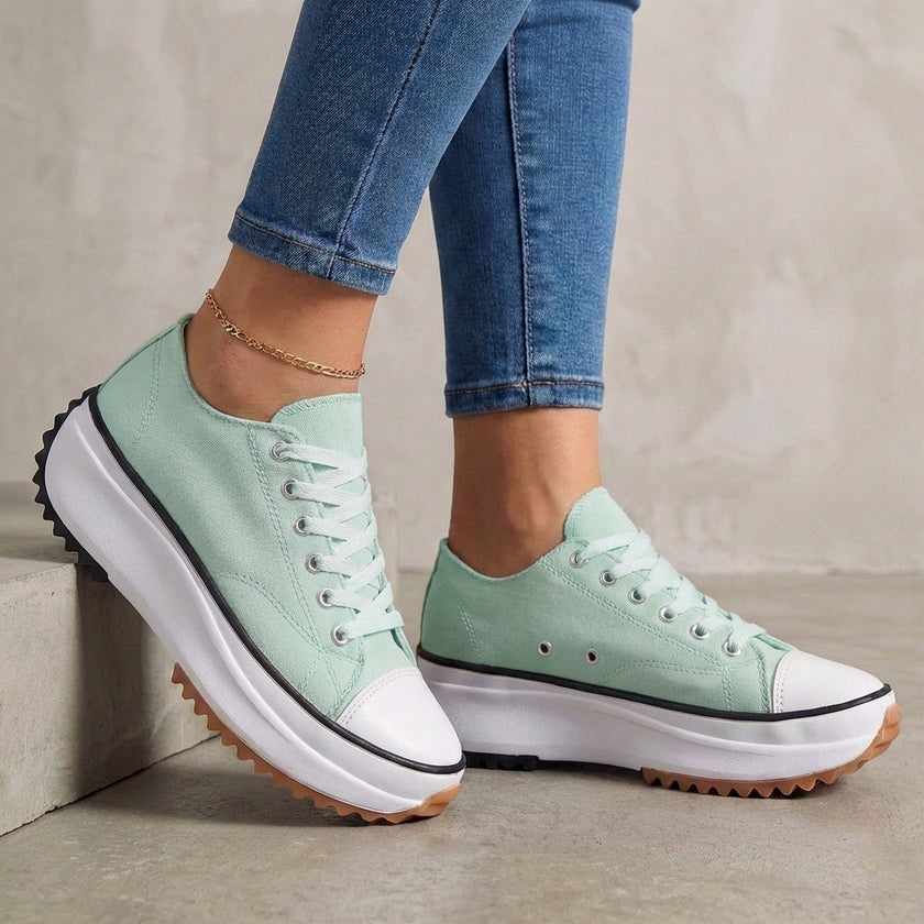 Green FJØRNA women's orthopedic lace-up sneakers with supportive design and comfortable fit, ideal for everyday wear.