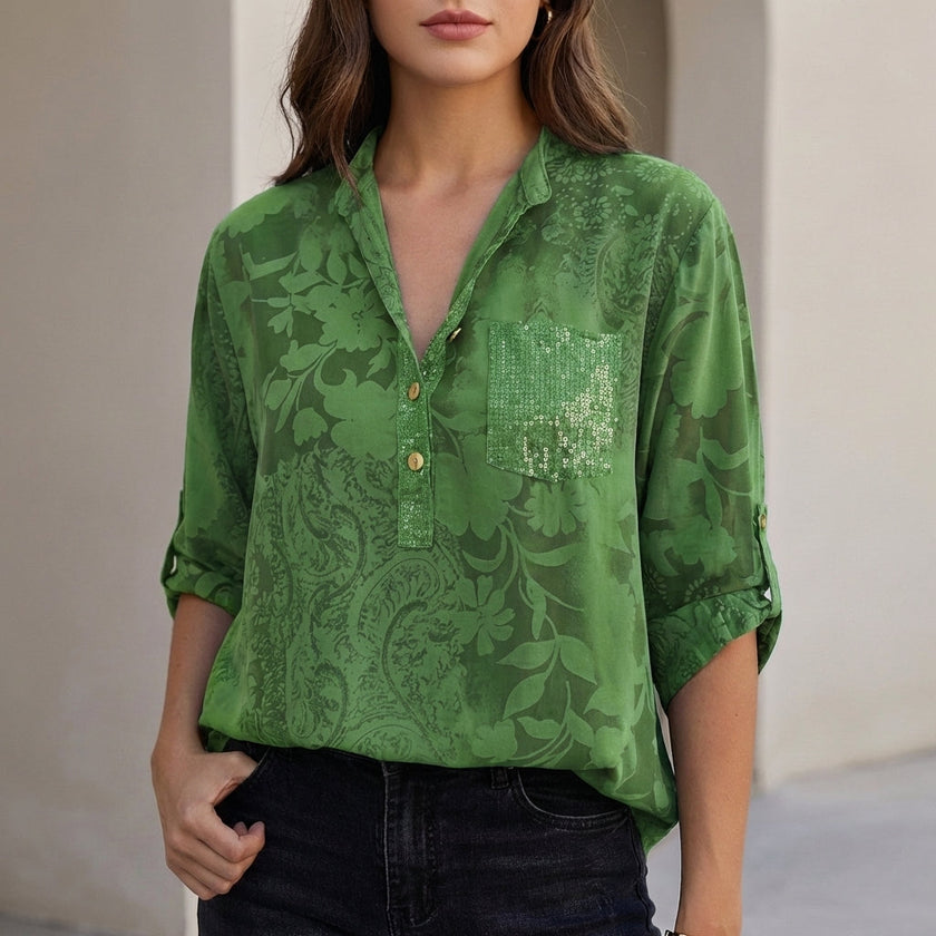 Green floral V-neck summer blouse for women by FJØRNA, made of denim fabric, stylish and lightweight top for warm weather.