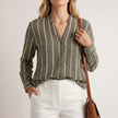 Green striped summer blouse for women with long sleeves and button front by FJØRNA, casual and stylish top for warm weather.
