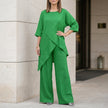 FJØRNA green relaxed two-piece set with flowing wide-leg pants, stylish and comfortable for casual or elegant wear.