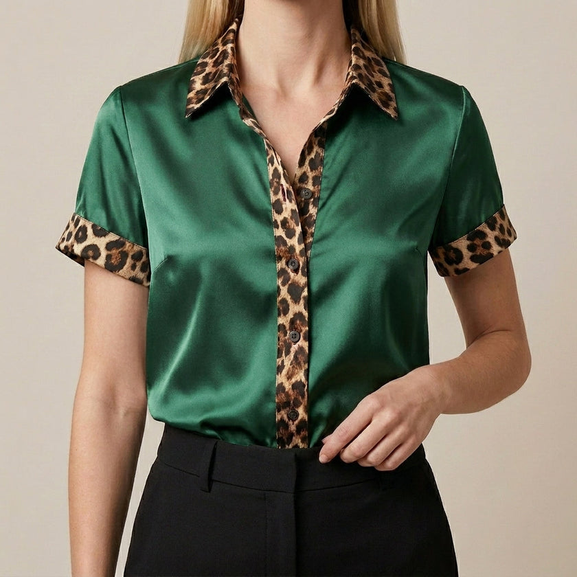 FJØRNA women's summer blouse in green with leopard print, short sleeves, lightweight fabric, perfect for warm weather.