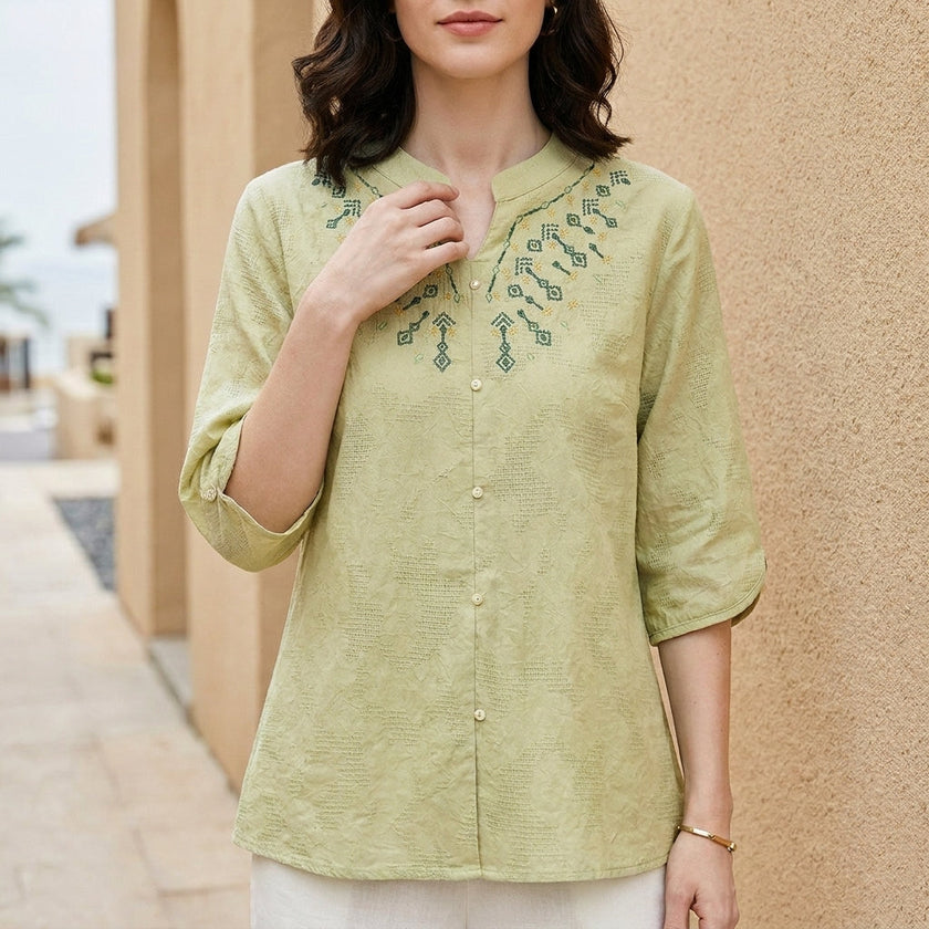 Green denim flowy summer blouse for women by FJØRNA, lightweight top with relaxed fit and casual style.