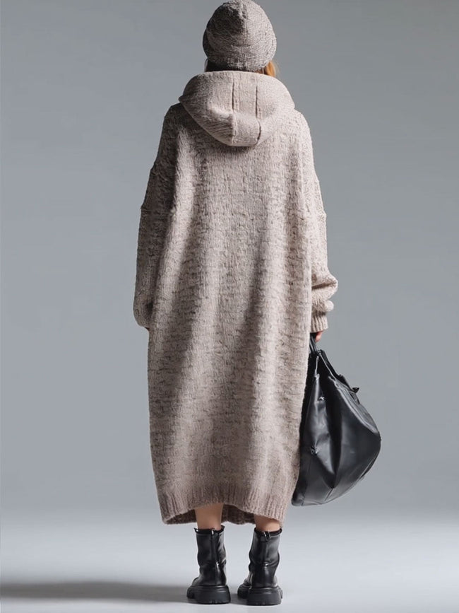 Grey knit floral midi dress for women by FJØRNA, featuring a fitted bodice and flowing skirt with floral pattern.