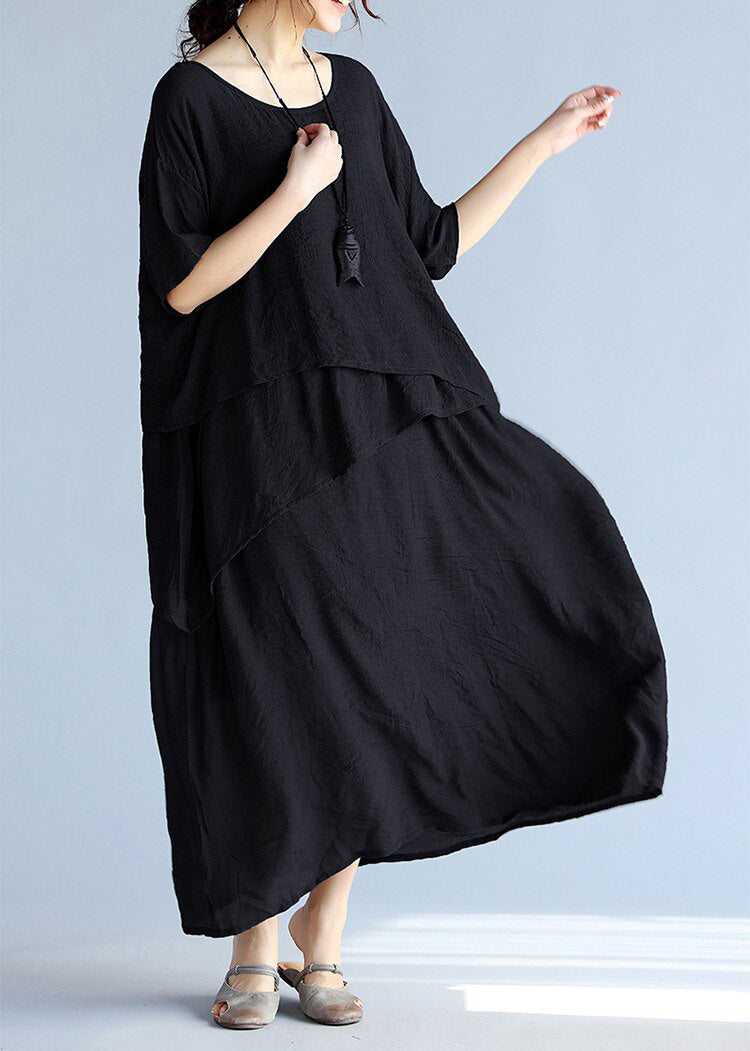 Gray linen cotton maxi dress by FJØRNA featuring a casual wedding dress style, with a flowing silhouette and relaxed fit.