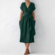FJØRNA women's elegant midi dress with V-neck and short sleeves, stylish and comfortable for casual or formal wear.