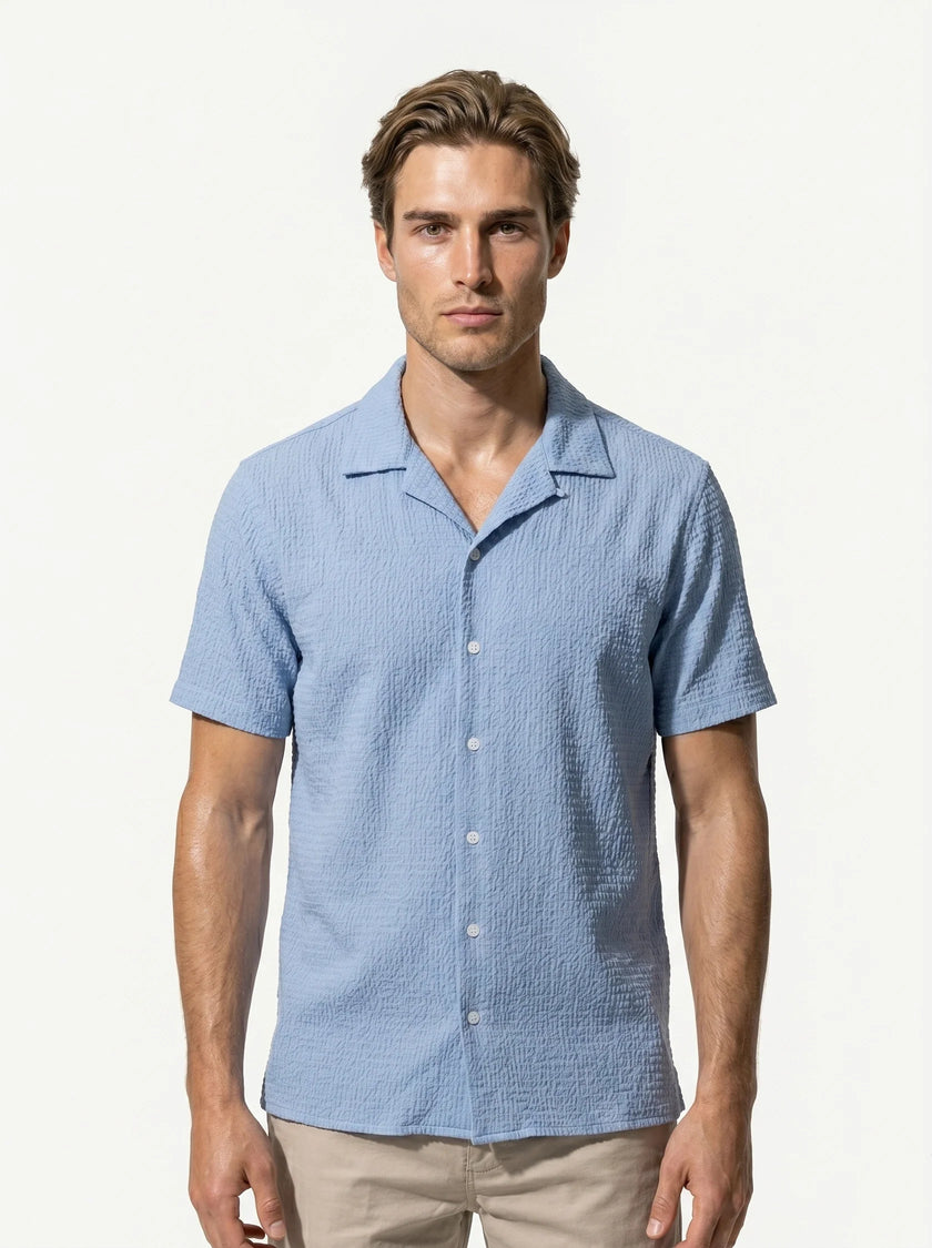 FJØRNA men's casual short sleeve button-up shirt, light fabric with a classic design, displayed in a close-up shot.