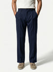 FJØRNA men's straight fit tailored trousers, classic style, in a neutral color, focused on the waist and leg fit.