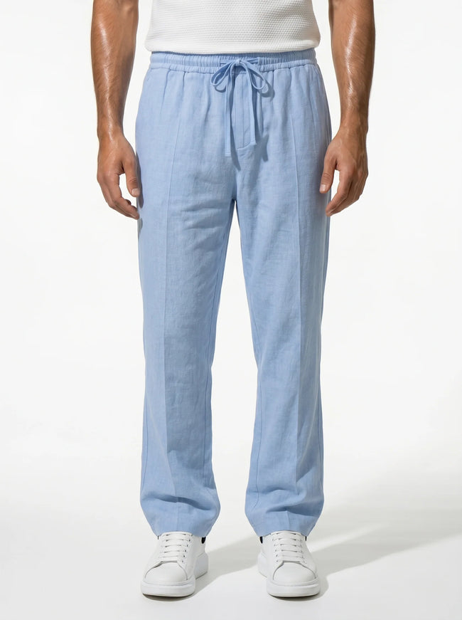 Men's linen trousers by FJØRNA with a relaxed fit, breathable fabric, ideal for summer wear.