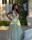 FJØRNA women's halter neck corset midi dress featuring a fitted bodice and flowing skirt, perfect for day to night wear.