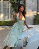 FJØRNA women's halter neck corset midi dress with fitted bodice and flowing skirt, perfect for day to night occasions.