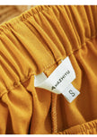 High-waist linen blend shorts for women with elastic waistband, stylish and comfortable FJØRNA pants displayed in the image.