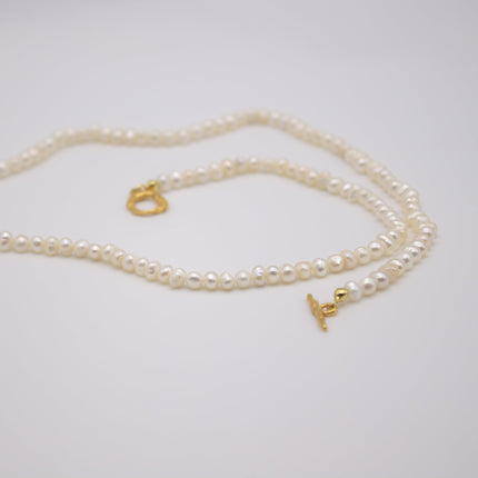 HELGJA Bridal Jewelry | Pearl Necklace Featuring a Gold-Plated Clasp