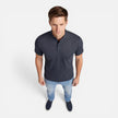 Men's short sleeve Henley shirt by FJØRNA, soft cotton fabric, slim fit casual style, shown in a natural relaxed pose.