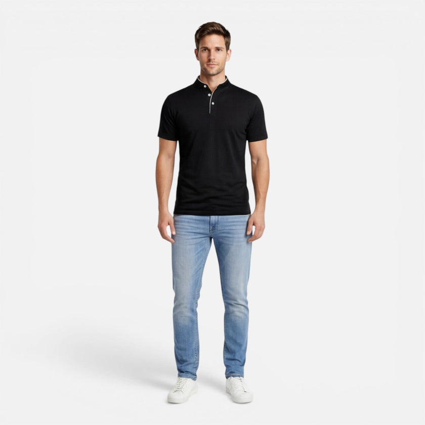 Men's short sleeve Henley shirt by FJØRNA, soft cotton, slim fit, casual men's shirt with buttoned neckline, shown on a model.