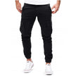 Men's cargo pants by FJØRNA with functional pockets and ample storage, shown in a relaxed fit style.