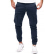 FJØRNA men's cargo pants with functional pockets and ample storage, featuring a relaxed fit and durable fabric.
